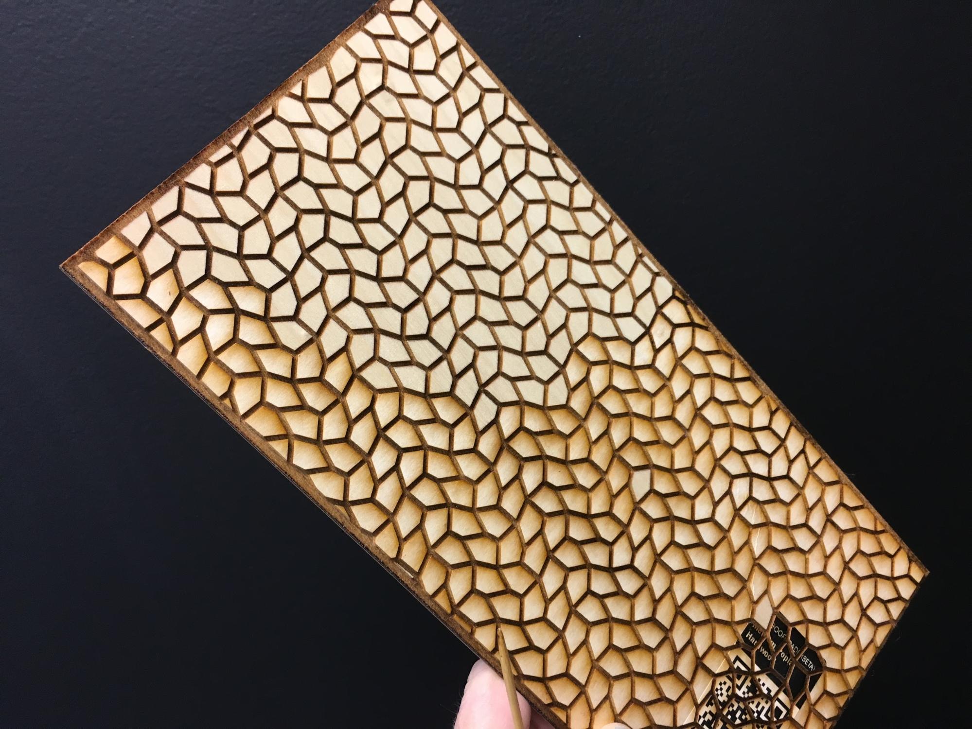 Laser cut closed-tile design of a Type 9 pentagonal tessellation
