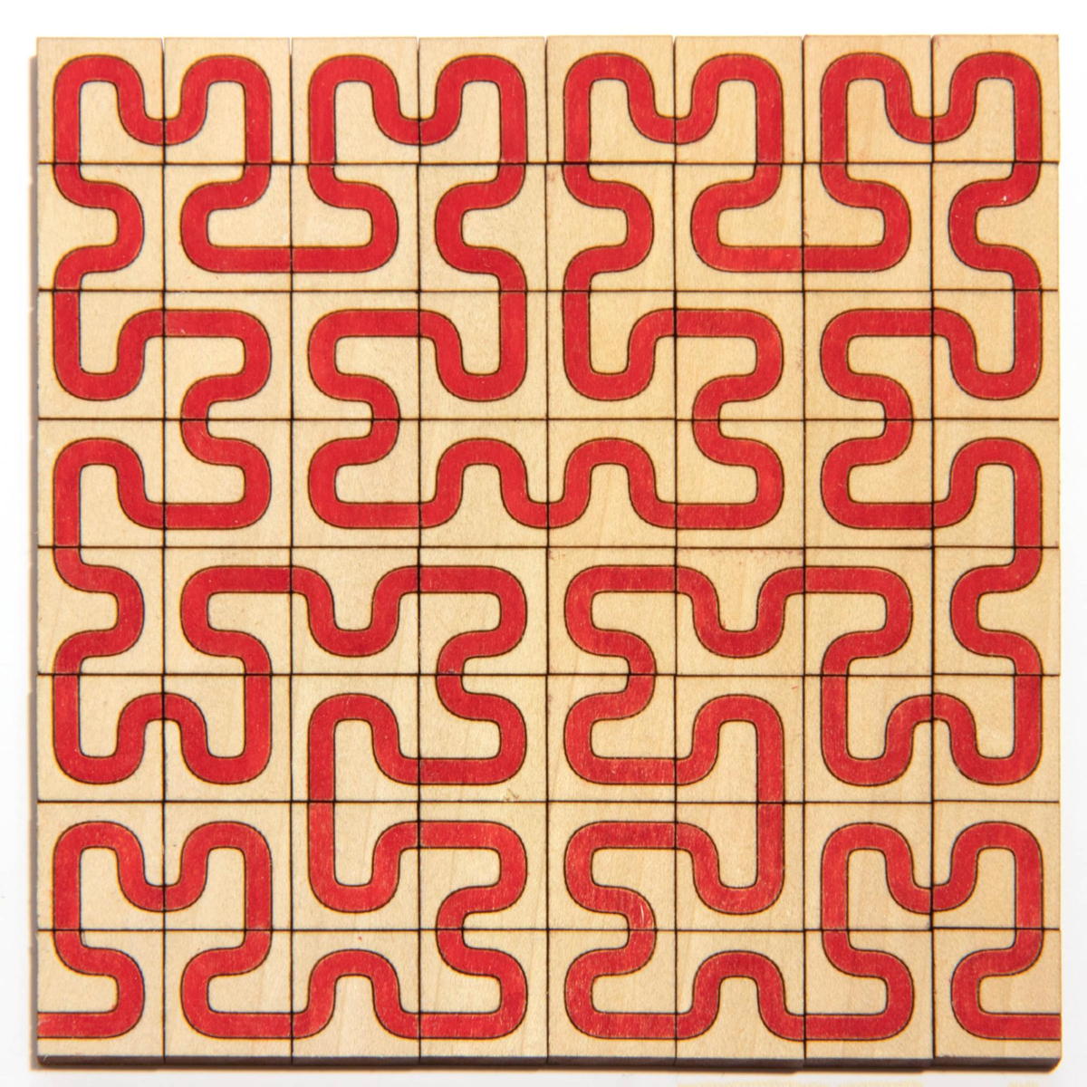 The Hilbert curve can also be defined by a set of tiles. The tiles were cut out and colored by hand afterwards. (Photo: Edmund Harriss)